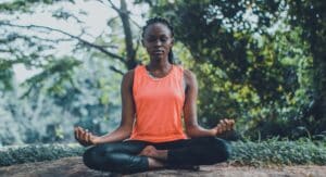 A woman sitting meditation