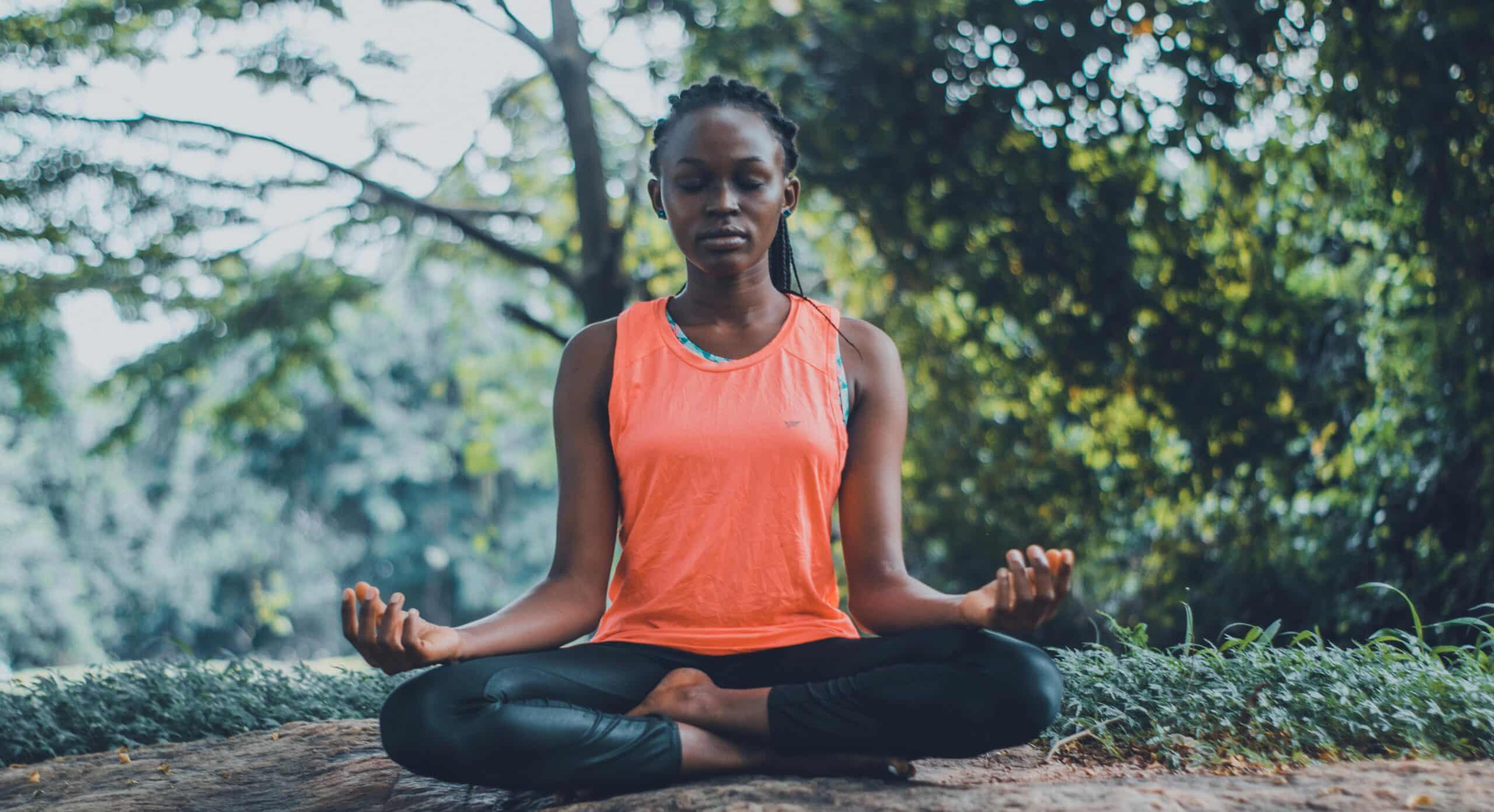 A woman sitting meditation